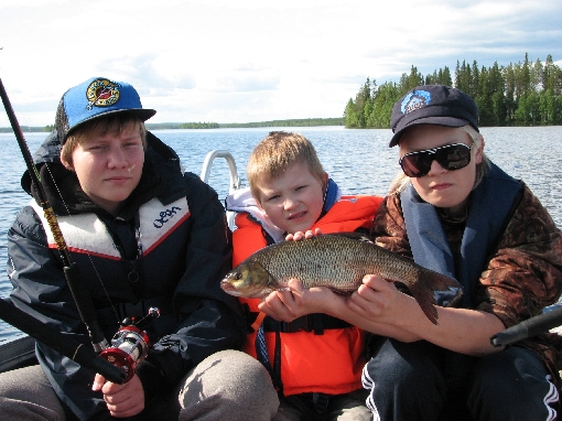 Ide and the boys on Lake Muojärvi.